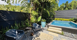 Hidden Palms Luxury Three Bedroom Villa Rarotonga surrounded by lush tropical gardens