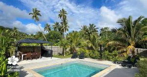 Palm Tree Villas Rarotonga tropical villa exterior with lush gardens